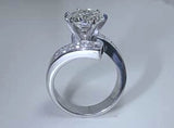 6.00ct Round Brilliant Diamond Engagement Ring 18kt White Gold and Princess diamonds